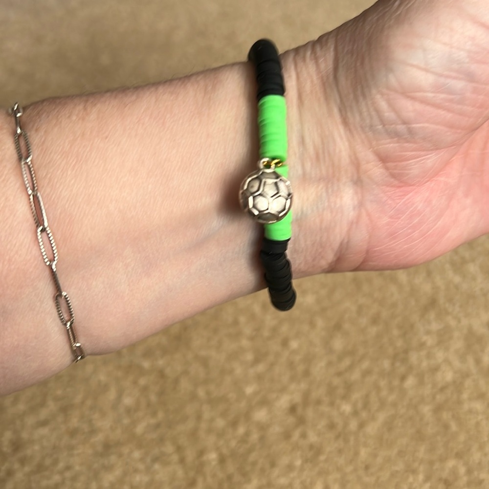 Bracelet. Handcrafted. New. Clay beads. Black, green. Soccer ball charm.
